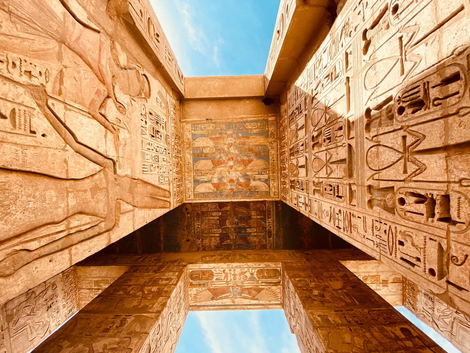 Hieroglyphs carved into the walls of an ancient Egyptian temple